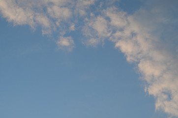Naklejka na ściany i meble Blue cloudy sky.Background