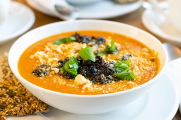 Vegan food. Pumpkin and carrot soup with cream. Detox diet. 