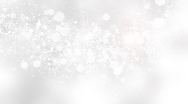 White Snow Blur Abstract Background. Bokeh Christmas Blurred Beautiful Shiny Christmas Lights