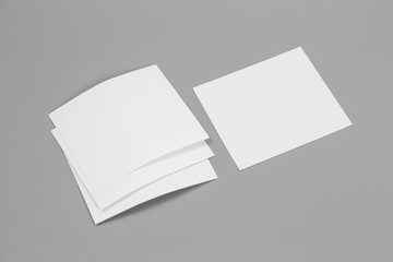 Blank portrait mock-up paper. brochure magazine isolated on gray, changeable background / white paper isolated on gray