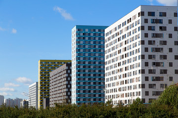 Cranes over the house under construction .Horizontally.