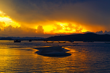 Sunset on beach with twilight at Baan Koh Teab