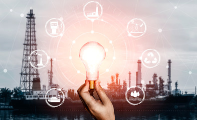 Green energy innovation light bulb with future industry of power generation icon graphic interface....