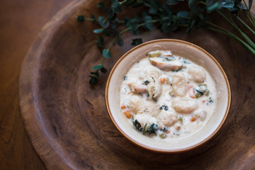 Traditional Italian chicken gnocchi soup in a bowl