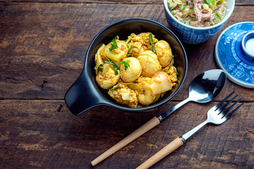 Fried with Egg Sausage in yellow curry , Stir-fried Egg Sausage curry