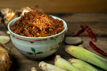 Galangal chili paste or Nam Prik Kha North Local thai food on old wood background drak style