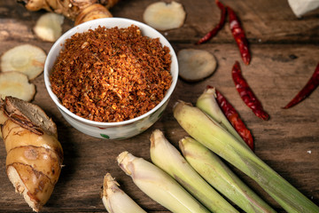 Galangal chili paste or Nam Prik Kha North Local thai food on old wood background drak style
