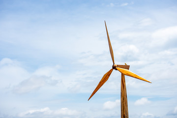 Windmills are made of wood background sky with beautiful clouds.