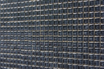 Black ceramic squares combined into a lattice wall background