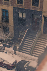 Dreamy scenery during a massive winterstorm with heavy snowfall in Harlem, New York, USA