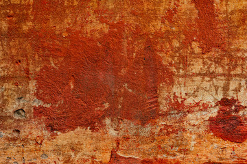 Texture of a concrete wall with cracks and scratches which can be used as a background