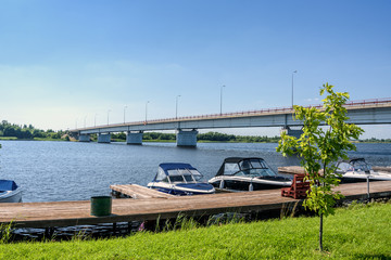 Fototapeta premium The small motorboat at pier