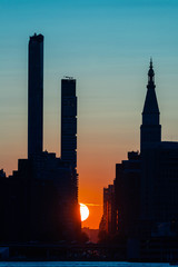Fototapeta na wymiar Manhattanhenge is one of the Summer's most fantastic event at Manhattan New York . 2019 July 10th and 12th were the best weather condition to watch the fantastic Manhattanhenge.