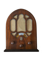 antique wooden radio isolated on white background. Vintage object that recalls the technology of past years