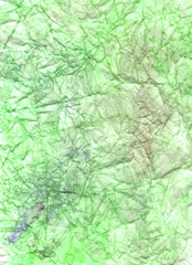 Green crumpled paper. Wrinkled  background. Color abstract wallpaper. Colorful craft page.
