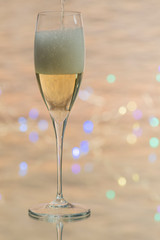 two glasses of champagne on a background