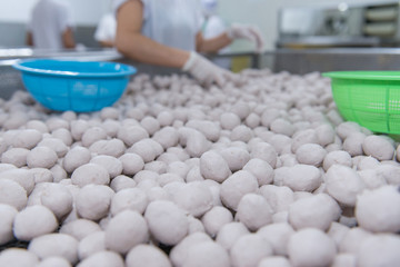 Fototapeta na wymiar Choose pork meat balls in basket for good quality with blur background