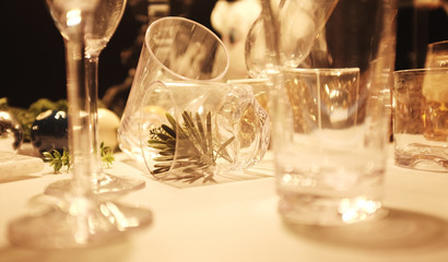 blur Many empty glasses on the table with still life pattern on a table against restaurant background.copy space