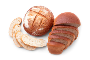 Top view on a group of beautiful delicious bread slices and round fresh baked crisp bread isolated on a white background
