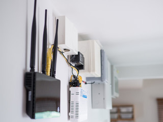 Close up of wireless router on the wall.