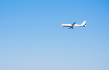 Fototapeta na wymiar Simple photo Airplane in blue sky, travels concept
