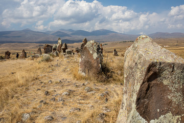 Fototapeta na wymiar Carahunge, also called Zorats Karer, Karahunj, Qarahunj and Carenish. Landscape. 