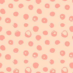 Abstract dots seamless pattern. Kid's fashion design print. Design elements for baby textile. Hand drawn doodle repeating shapes. Cute pink and beige wallpaper