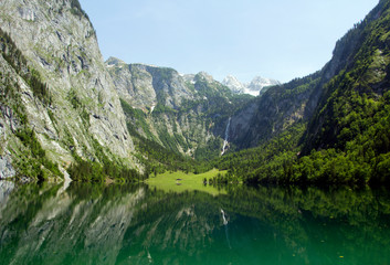 Naklejka na ściany i meble Lake und waterfall in Alps mountain
