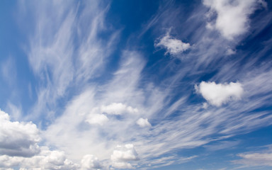 Naklejka na ściany i meble Blue sky and white clouds. Wind