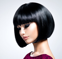 Beautiful young woman with bob hairstyle.