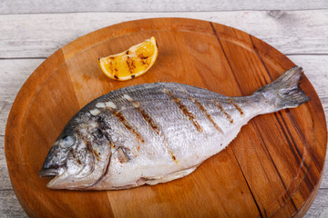 Grilled dorada with lemon