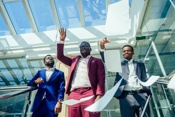 mixed race business people sitting in modern office copy space