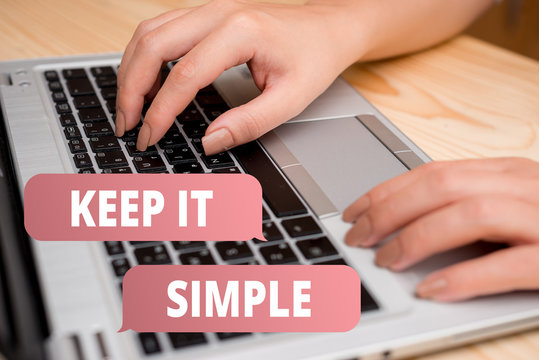 Handwriting text writing Keep It Simple. Conceptual photo to make something easy to understand and not in fancy way woman laptop computer smartphone mug office supplies technological devices