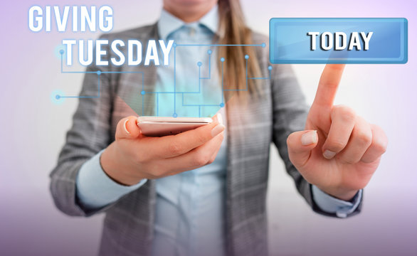 Word writing text Giving Tuesday. Business photo showcasing international day of charitable giving Hashtag activism Lady front presenting hand blue glow futuristic modern technology tech look