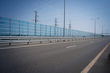 Fototapeta na wymiar Noise barrier wall on a highway