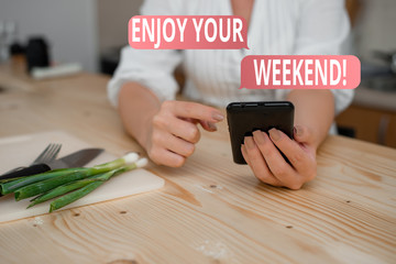 Conceptual hand writing showing Enjoy Your Weekend. Concept meaning wishing someone that something...