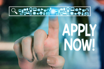 Text sign showing Apply Now. Business photo text request something officially in writing or by sending in form Woman wear formal work suit presenting presentation using smart device