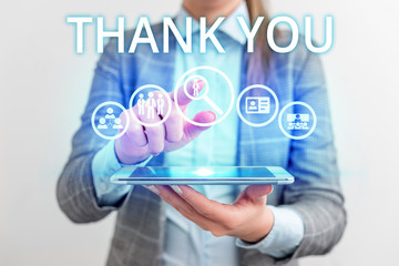 Conceptual hand writing showing Thank You. Concept meaning polite expression used when acknowledging gift service compliment Lady front presenting hand blue glow futuristic modern technology