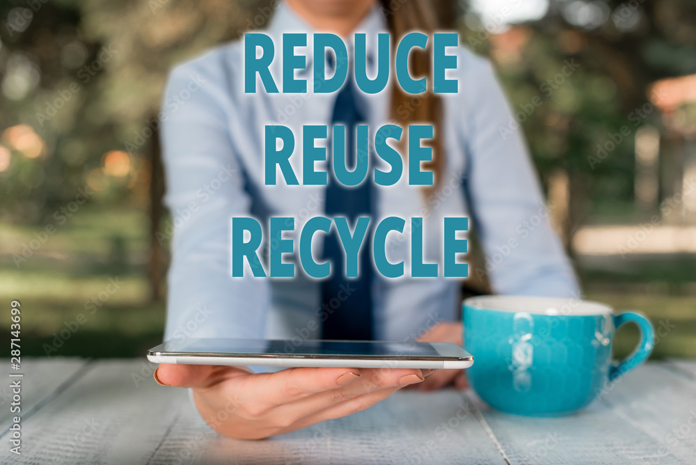 Poster handwriting text reduce reuse recycle. conceptual photo environmentallyresponsible consumer behavior