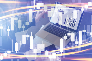 Candlestick chart in foreground. In background are business people with laptops, smartphones and other gadgets. Double exposure.