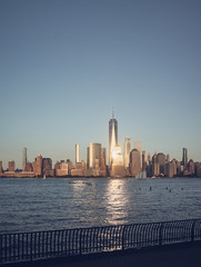 Fototapeta na wymiar Manhattan skyline at sunset, color toning applied, New York City, USA.