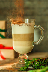 Coffee with milk and gifts on the table - festive atmosphere, (latte) New Year and Christmas. top food background. copy space