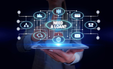 Handwriting text Need A Loan Question. Conceptual photo asking he need money expected paid back with interest Woman wear formal work suit presenting presentation using smart device