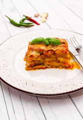 Eggplant with parmesan in a plate traditional Italian recipe