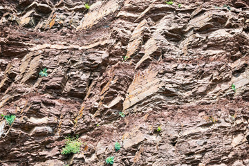 the red brown granite rock for background, texture