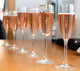 Glasses of pink champagne