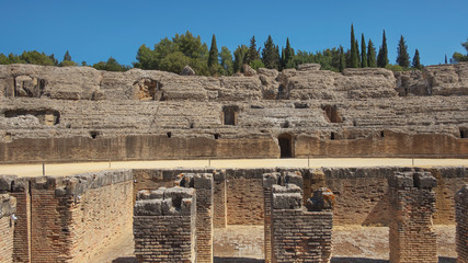 Ruins of the splendid amphitheater, part of archaeological ensemble of Italica, city with a...
