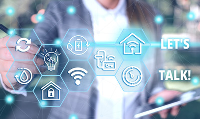 Handwriting text Let S Is Talk. Conceptual photo suggesting in the beginning of a conversation on the topic Female human wear formal work suit presenting presentation use smart device