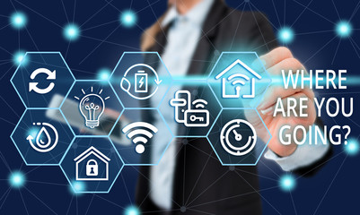 Text sign showing Where Are You Goingquestion. Business photo showcasing used to ask someone the destination headed to Female human wear formal work suit presenting presentation use smart device