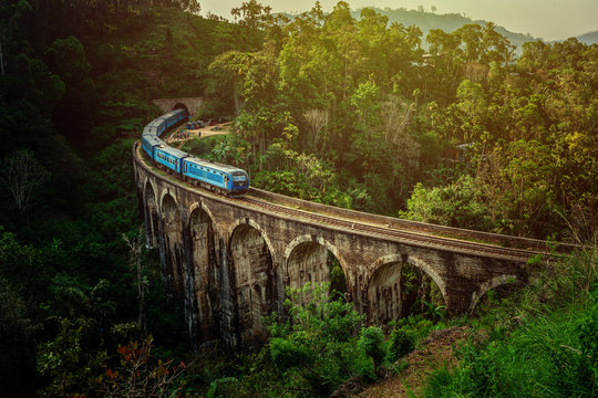 Train on the Nine Arches Demodara Bridge or the Bridge in the sky located in Demodara near Ella city, Sri Lanka.